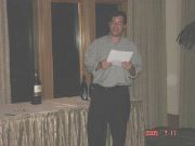 Michael announces the winning bids. We raised $2600 from the silent auction alone!